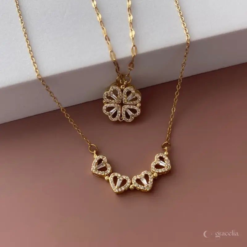 ¡Brilla con Elegancia! Collar 2 en 1 Dorado con Dije Corazones y Trébol + caja de regalo! ¡El Regalo Perfecto!
